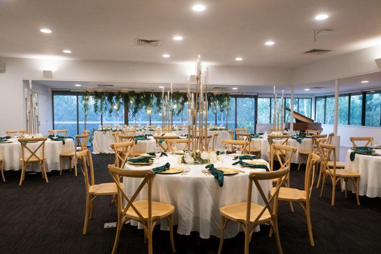 Round banquet tables set for a corporate dinner in the Ferntree Room at Walkabout Creek