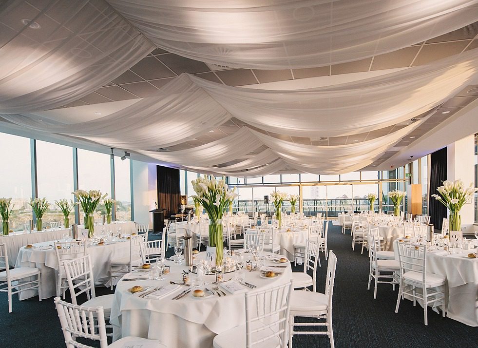 Room Three Sixty set for a wedding reception with draped ceilings and floor-to-ceiling views over Brisbane